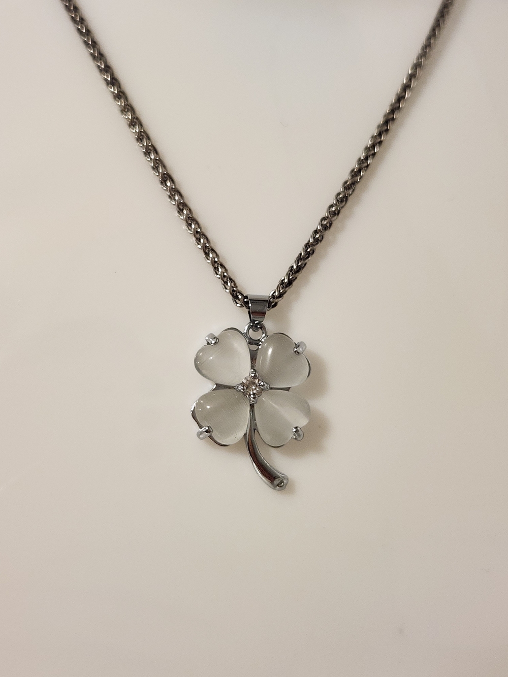 Silver-Tone Clover Pendant Necklace with White Cat-eye Petals